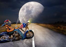 Biker and big moon