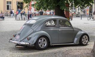 small Auto Vw Beetle parked in the town square