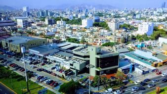 Beautiful landscape with the colorful buildings in the city, among the mountains in Peru