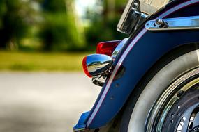 wheel on a motorcycle close up on a blurred background
