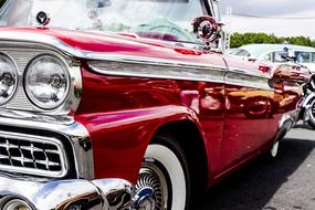 closeup photo of shiny oldtimer red car