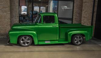 Green retro shiny Ford truck