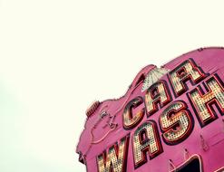 Car Wash Sign on pink wall