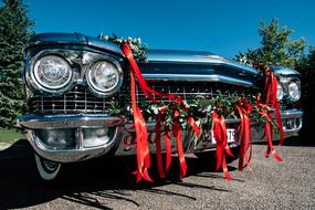 Hubcap Transportation with red bows