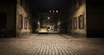 Beautiful street with the car in shadow and light in Copenhagen, Denmark