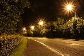 landscape of bright night lights along the road