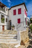 low-rise white buildings on Skopelos island, Greece