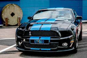 Beautiful, shiny, black and white Ford Mustang car