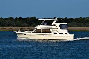 the yacht sails along the seashore