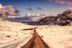 Beautiful landscape of the snowy mountains in Scotland, in winter