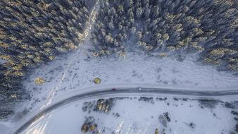 bird's eye view of the road in a snowy landscape