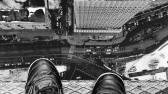 feet over the city abyss