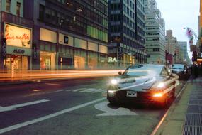 Cars on the road of New York with colorful lights