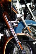 motorcycles parked in a row close-up