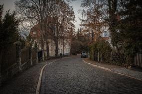 road next to houses in germany in autumn