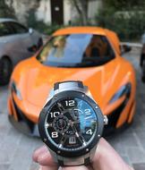 Car Mclaren and clock