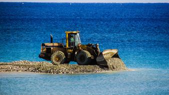 Bulldozer and water