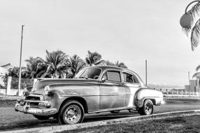 retro Auto on roadside, black and white, cuba