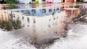 Rain Mirroring Houses road