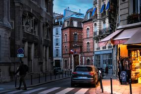 car on alley in historical center, France, Paris