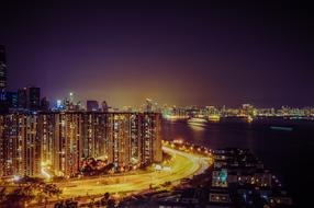 panoramic view of illuminated modern city at night