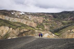 tourists in the mountains of Iceland
