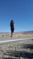 Girl Walking Mountain road