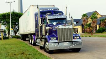 purple american truck on the road