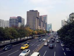 panoramic view of traffic among city skyscrapers