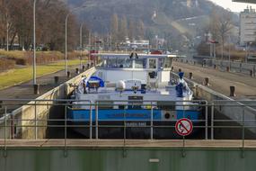 Motor tanker, with the sluice system, on the Rhine river in Birsfelden, Switzerland