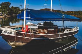 wooden ship on calm water