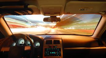 bright evening sky through car windshield
