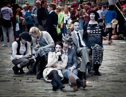 Colorful street performers on the Edinburgh Fringe in Scotland, on the street