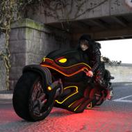 Person, on the colorful, shiny motorcycle with lights on the street, clipart