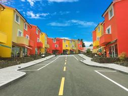 colorful residential buildings along the road