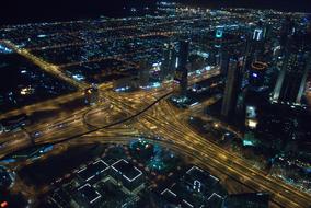 panoramic view of skyscrapers in dubai at night
