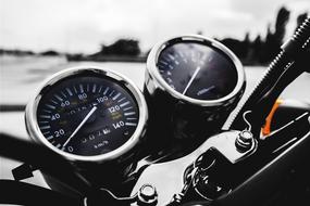 motorcycle dashboard close up on blurred background