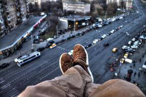 human feet on the roof