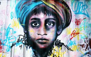 Street Art Graffiti face boy