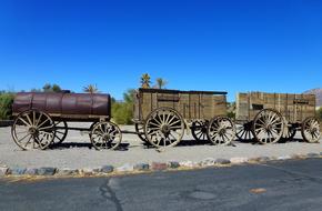 Beautiful landscape with the old trolley, at blue sky on background, in the desert, in USA