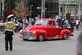 Chevrolet Pic Up Truck red and people