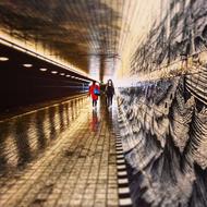 people walking onl Underpass