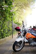 parked motorcycles on a town street