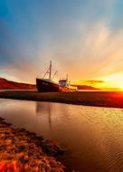 Ship and sunset in Iceland