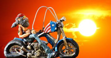 Biker at sunset figure