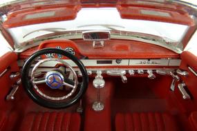 red interior of a retro Mercedes car