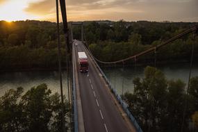 landscape of car on Bridge over Waters River