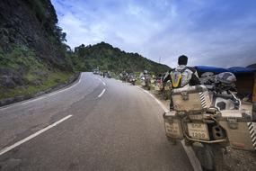 motorcyclists on a steep mountain pass in Vietnam