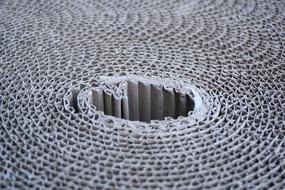 Close-up of the hole, in the corrugated board