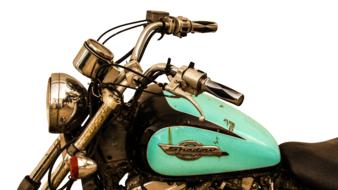 vintage motorcycle with green tank